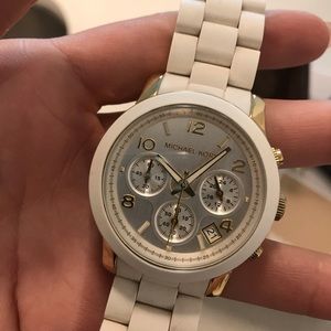 women’s gold and white Michael Kors watch - MC5145
